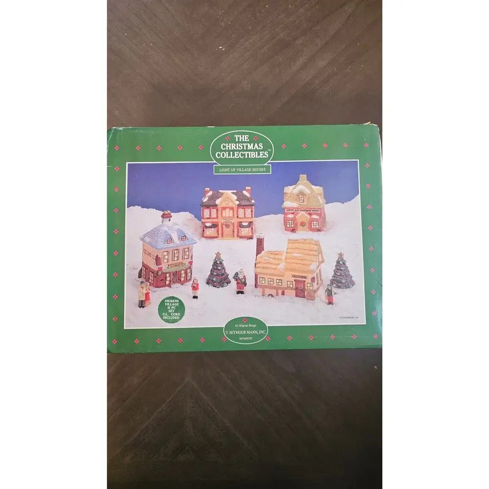 New In Box The Christmas Collectibles by Seymour Mann 11 piece light up houses‎